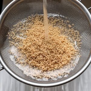 Adding a water to quinoa